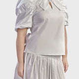 BLUSA CON MANICA A PALLONCINO
